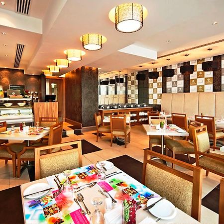Oaks Liwa Executive Suites Abou Dabi Restaurant photo