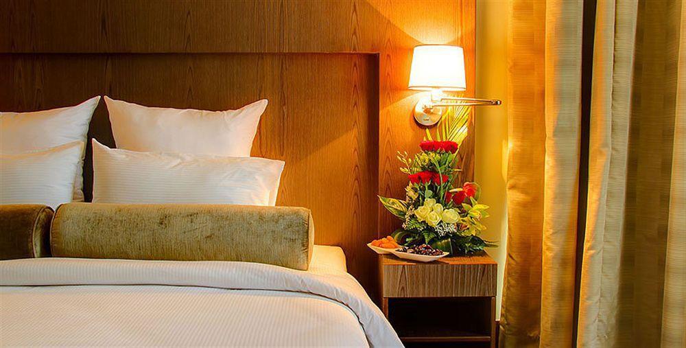 Oaks Liwa Executive Suites Abou Dabi Chambre photo